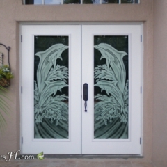 etched door glass with dolphins