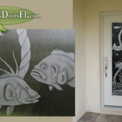 glass door insert with etched fish and stingray