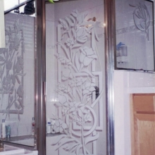 shower door with etched floral design