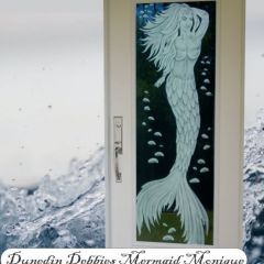 Dunedin-Debbies-Mermaid-Monique-on-hurricane-impact-entry-door