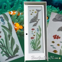 White-pantry-door-with-dolphin-and-clown-fish-design