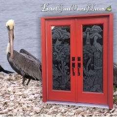 Pelican-watching-sailfish-and-lighthouse-on-double-red-front-doors-glass-etching