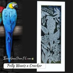 Parrot-on-interior-glass-door-with-leaves