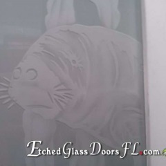 Manatee-on-frosted-interior-door