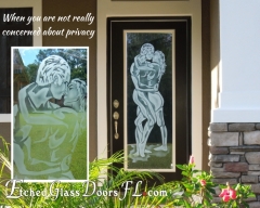 Nude man and woman on glass entry door