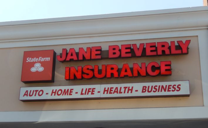 Jane Beverly Insurance office has a glass door