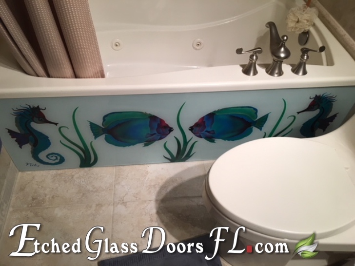 Bathroom tub remodel with glass panel