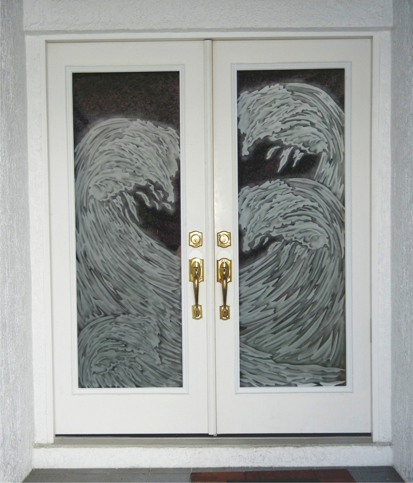 etched glass waves on glass door inserts in front entry doors