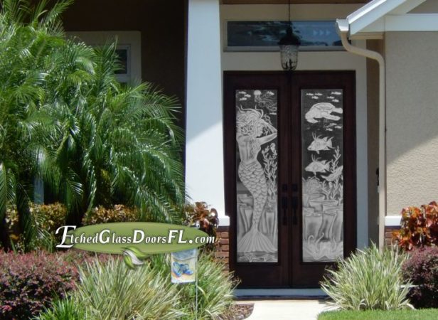 Glass Front doors with etched mermaid and fish